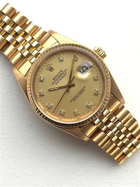 rolex oyster perpetual 18k gold plated 5-561|Rolex 18k gold watch price.